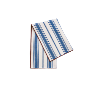 Striped towel with blue and white pattern on a white background